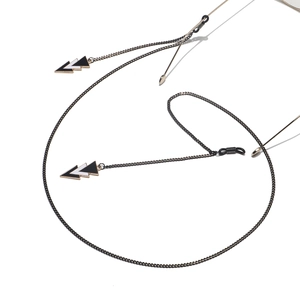 Minimalist black triangle pendant eyewear chain with adjustable rubber loops on white background