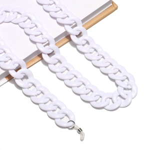 Close-up of a white acrylic chunky glasses chain with metal loops and silicone grips