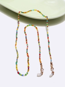 Detailed view of colorful bohemian beaded eyewear chain with gold lobster clasps and silicone loops
