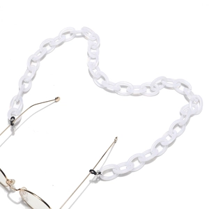Detail of white acrylic chain links for eyewear with secure rubber loops and metal hooks