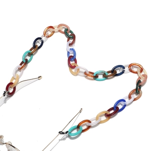 Close-up of colorful resin link eyeglass chain with rubber loops for glasses