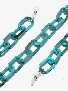 Detail of turquoise acrylic eyeglass chain with large textured links and silicone ends