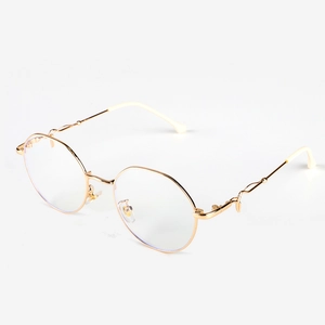 Retro gold metal round blue light blocking glasses with unique wavy temples and white tips