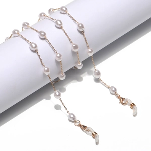 Elegant gold glasses chain with white pearls and non-slip silicone loops for sunglasses
