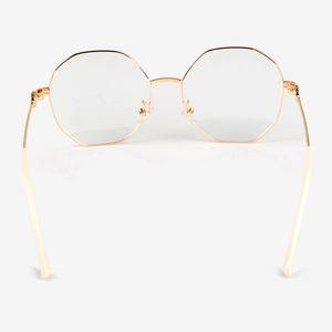 Minimalist gold metal hexagonal frame blue light blocking glasses with cream temple tips