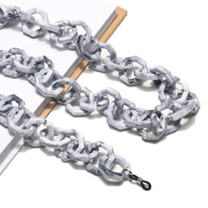Close-up of marble texture acrylic hexagon eyeglass chain with rubber anti-slip loops