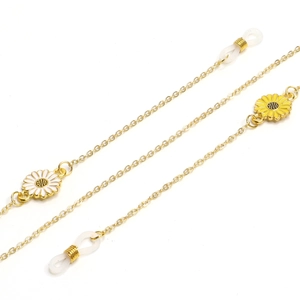 Chaîne de lunettes dorée avec pendentifs marguerites blanches et jaunes et boucles
