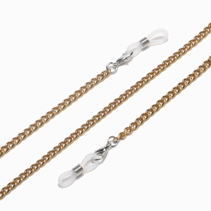 Detail of gold metal glasses chain featuring silver lobster clasps and silicone loops
