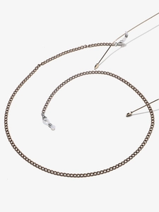 Detail of vintage bronze metal glasses chain with silicone loops and lobster clasps