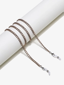 Close-up of bronze metal glasses chain with lobster clasps and silicone loops