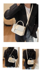 Detail of color-block mini square bag with blue and beige PU leather and hanging tag