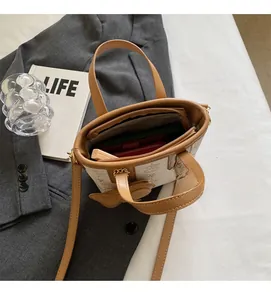 Close-up of the spacious interior compartment with a zipper pocket in this tote bag