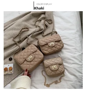 Three sizes of khaki quilted chain bags with gold twist locks and leather straps
