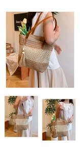Detail of contrast straw tote bag with brown leather straps and decorative tassel