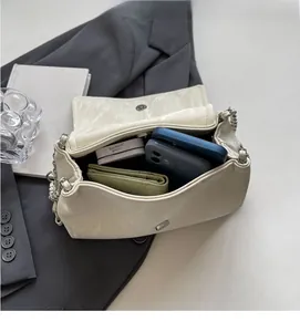 Interior view showing the large capacity of the butterfly envelope bag for daily essentials