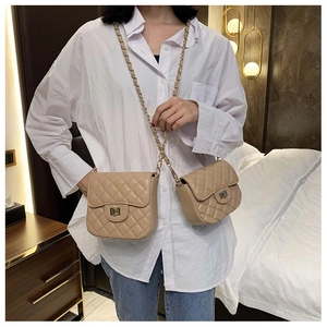 Detailed comparison of two sizes of beige quilted chain bags with gold twist locks