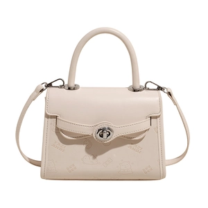 Minimalist beige crossbody bag with cartoon bear embossing and silver twist lock closure