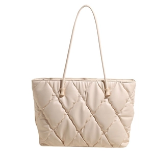 Chic quilted beige tote bag with rhombus stitching for women, stylish large capacity design