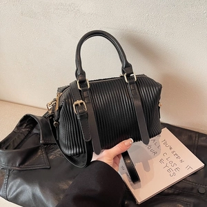 Retro black pleated Boston bag with gold hardware and adjustable strap for women