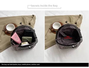 Interior view of shell bag showing main compartment and pocket with daily essentials
