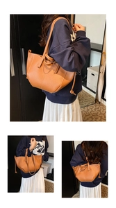 Vues détaillées du sac cabas en cuir grainé caramel avec surpiqûres verticales