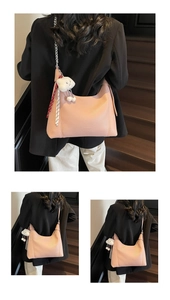 Pink lychee texture leather tote with chain strap, plush bear charm and plaid scarf detail