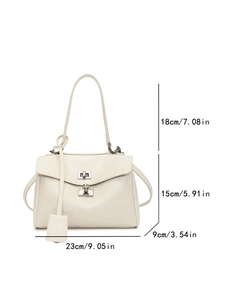 Detailed size guide of a cream white crossbody bag with dimensions and silver buckle lock