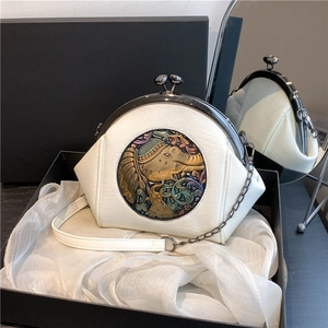 Vintage off-white leather doctor bag with elephant relief and elegant metal chain strap