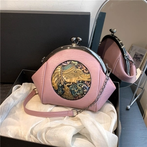 Pink clasp shell bag with embossed elephant icon and retro metal chain strap