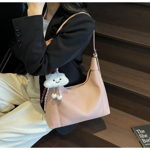 Pink lychee grain leather hobo bag featuring cloud charm and silk scarf decor