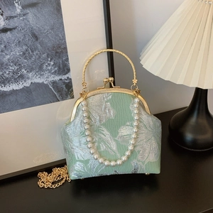 Mint green floral jacquard handbag with gold frame, pearl handle and chain strap