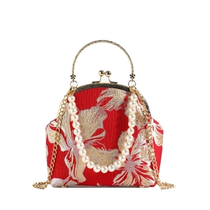 Elegant red silk cheongsam handbag with silver floral embroidery and pearl chain