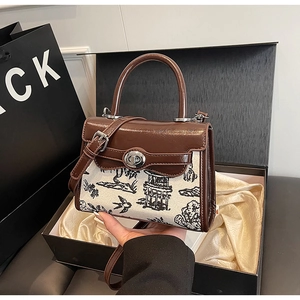 Detailed view of ink wash pattern handbag in elegant gift box with satin lining