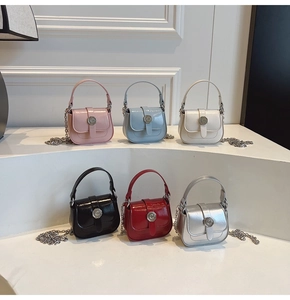 Detailed view of six mini crossbody bags in glossy leather with metallic C hardware