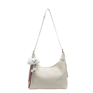 Chic beige crescent tote bag with litchi grain leather and cute plush cloud charm