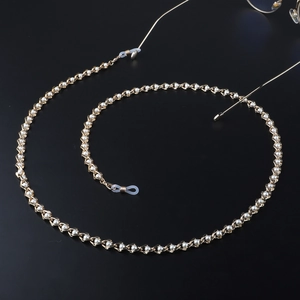 Chaîne de lunettes en perles tendance avec maillons dorés fixée aux lunettes