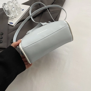 Vintage light blue cylindrical shoulder bag with letter print and zipper closure