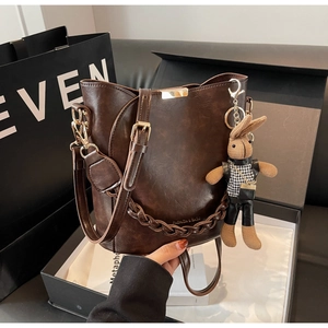 Women Bucket Bag Retro PU Leather Crossbody Handbag With Braided Handle And Rabbit Doll Charm Versatile Commuter Fashion