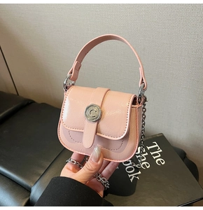 Pink mini square bag featuring a textured finish and C-letter metal clasp with chain strap