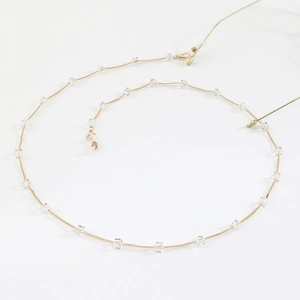Golden eyewear chain with square crystals and non-slip rubber loops for glasses