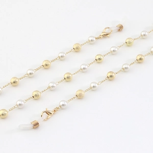 Chaîne à lunettes et collier doré avec perles blanches et perles dorées givrées