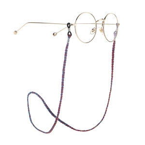 Multicolor braided eyewear strap with non-slip rubber loops on round glasses