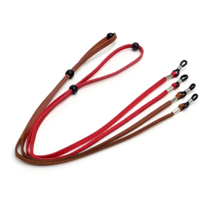 Adjustable sports eyewear cords in brown and red leather with non-slip loops