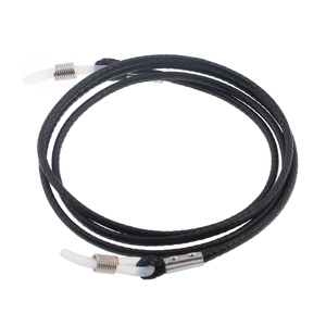 Detail of black woven eyeglass cord with silicone loops and silver metal springs
