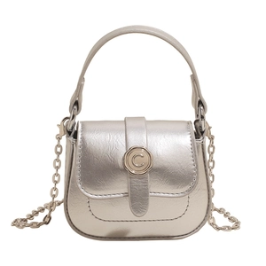 Elegant silver saddle bag with metallic finish, metal C-buckle and chain strap