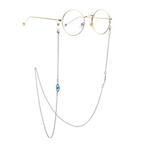 Stainless steel glasses chain with blue evil eye charms and gold round frame glasses