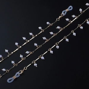 Elegant gold metal bar and pearl chain eyewear strap with adjustable silicone loops