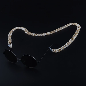 Detailed shot of tortoiseshell acrylic glasses chain with white silicone anti-slip loops