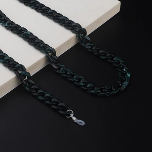 Detail of dark green marble acrylic eyewear chain with silicone ends and metal spring