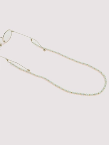 Detail view of light blue beads and golden accents on a 70cm fashion eyewear chain